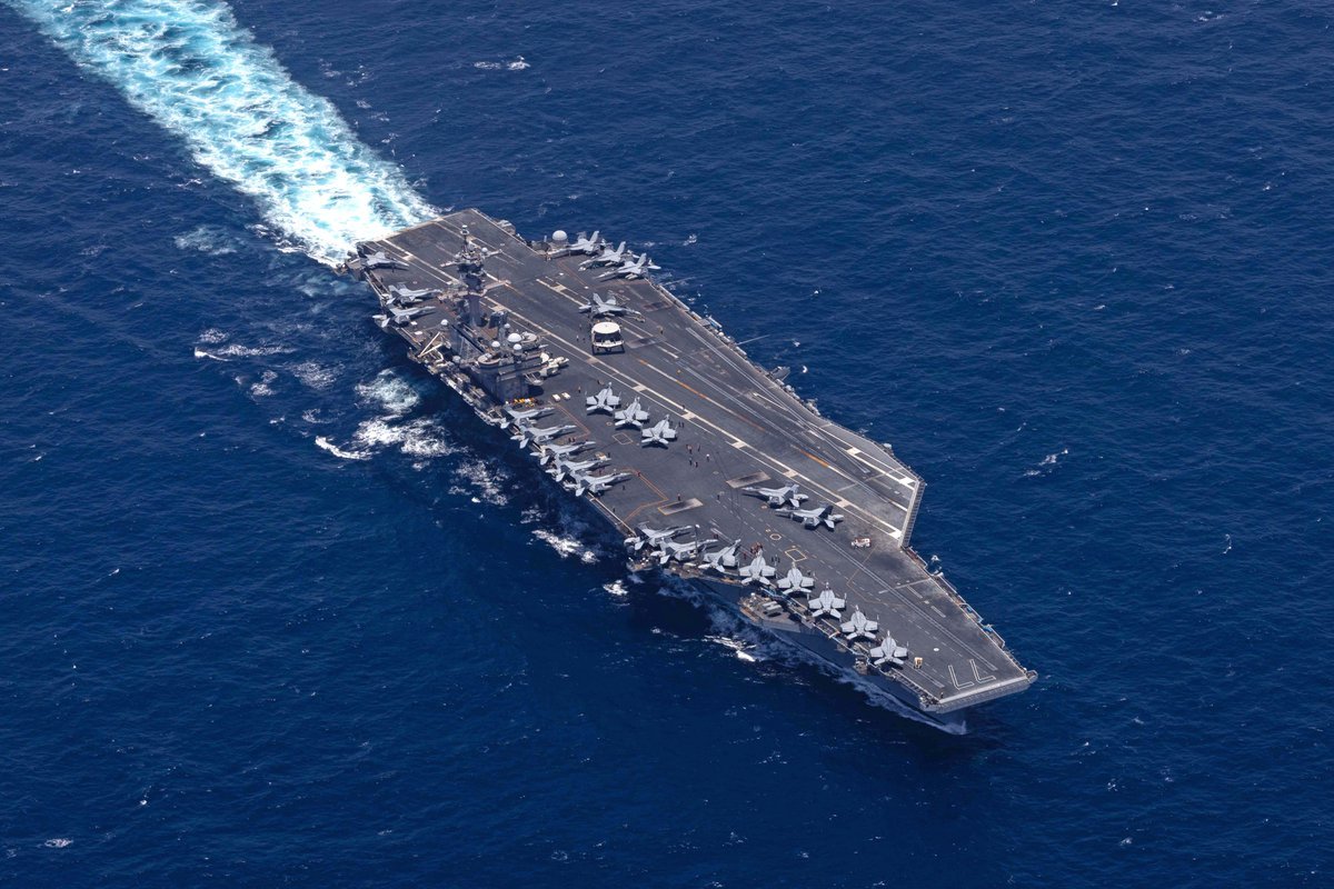 Donald Trump says the US is pausing its operation to guide stranded ships through the Strait of Hormuz